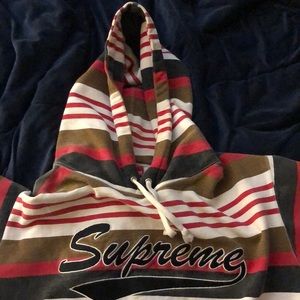 A striped supreme hoodie